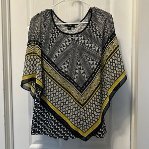 Sheer poncho with tank underneath